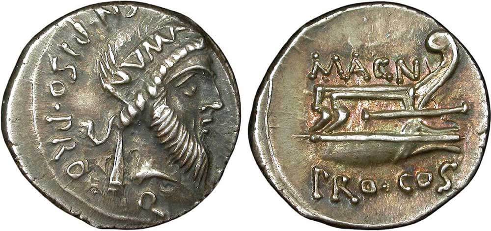 A coin with a prow of a ship in profile. The words MAGN PRO COS are written around.