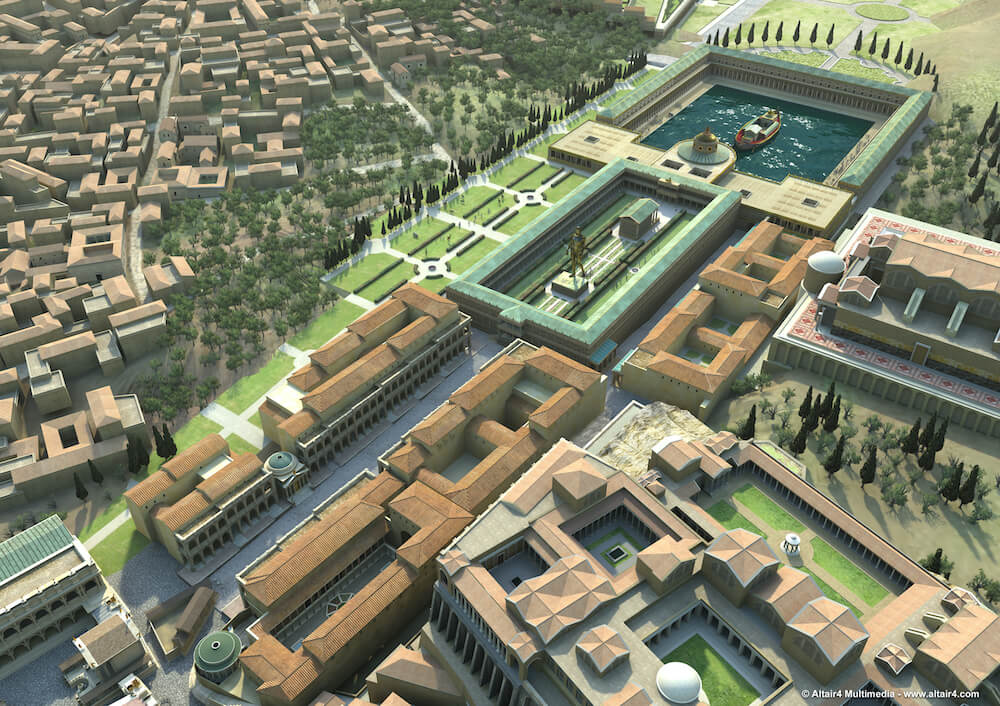 An aerial shot of a reconstructed palace. It has a large lake surronded by collonades and tall trees. There is a long walkway from the palace to the entrance.