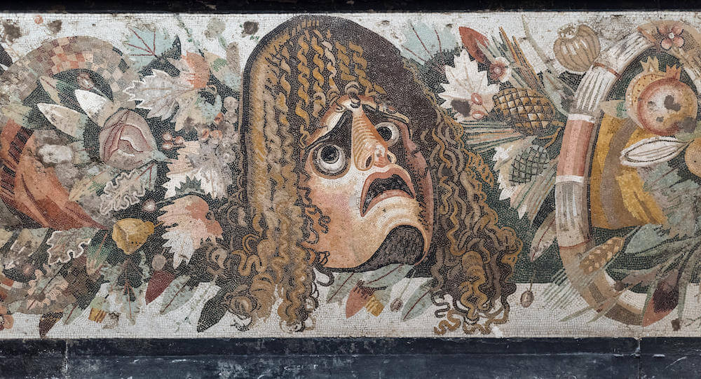 Mosaic of a theatrical tragic mask from the House of the Faun in Pompeii