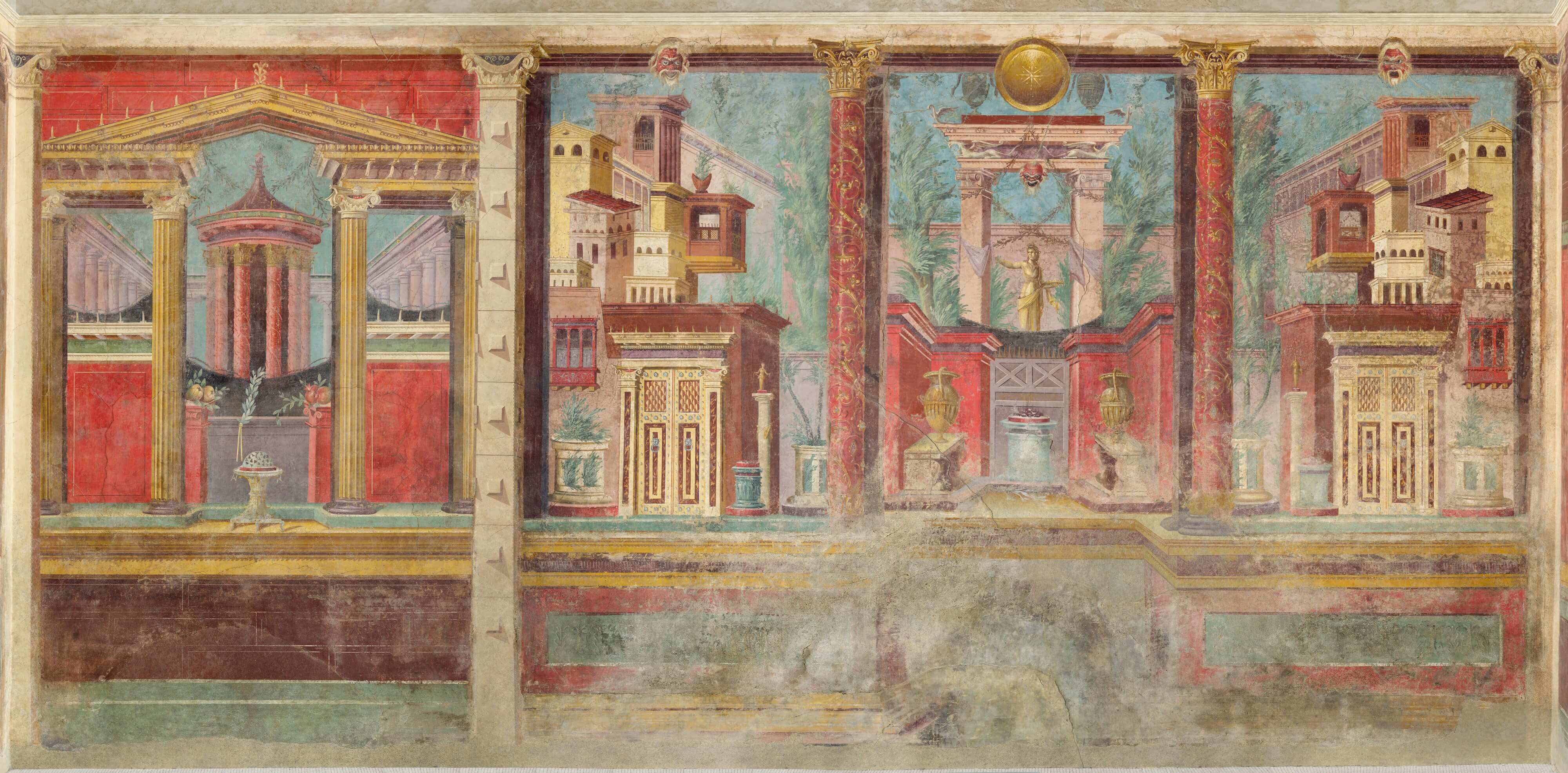 A wall painting showing an architectural scene. In the foreground are pillars painted in red and gold and behind them are buildings and gardens, all brightly painted.