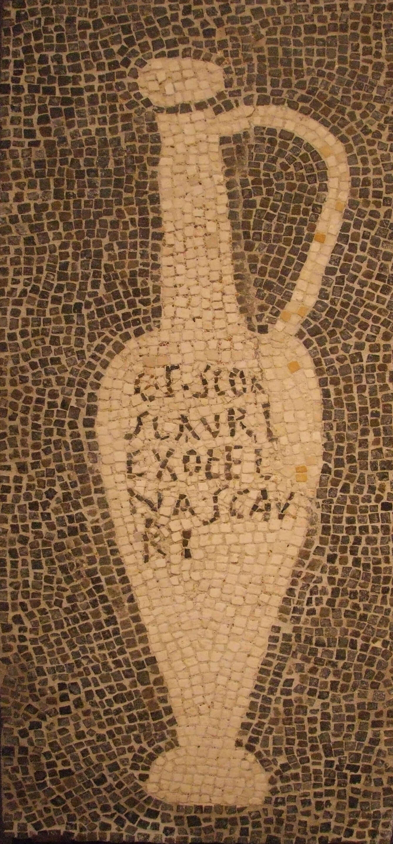 A mosaic of a bottle with a long, narrow neck and a handle.