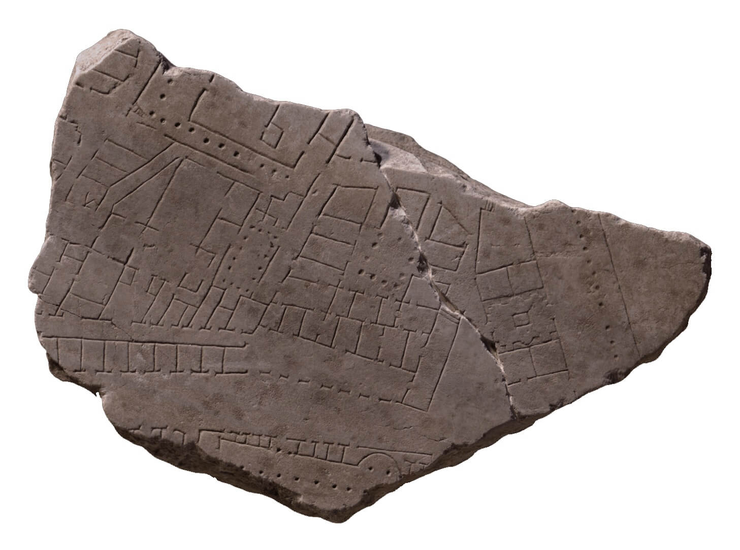 A broken stone fragment with markings on in little squares, lines, and dots.