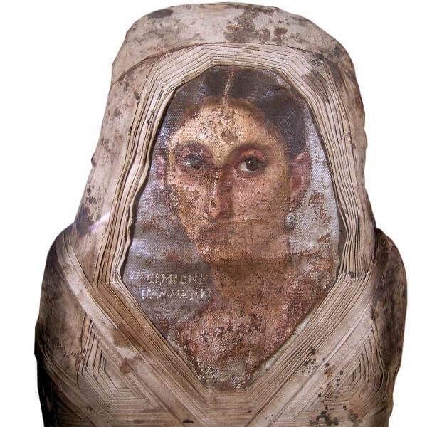 An Egyptian mummy. On the front is a painted portrait of a young woman with her hair tied back and a centre parting.
