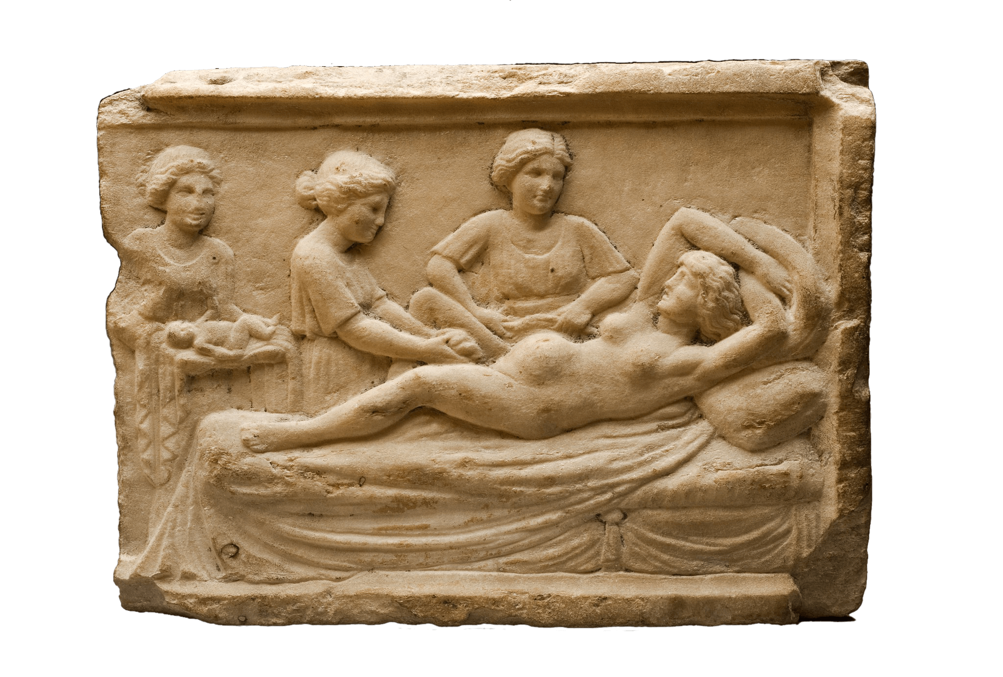A stone carving showing a woman in labour lying on a bed with her arms above her head. Around her three women stand, the woman on the left holds the newborn baby.