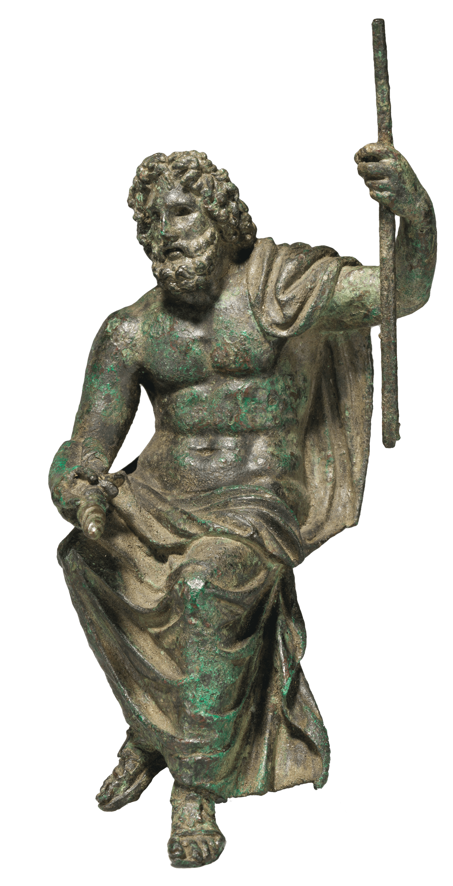 A metal statue of a seated man. He has a beard and long curled hair and wears a robe wrapped around his waist and across his left shoulder. In his right hand he holds a cylindrical object and in his left a long pole.