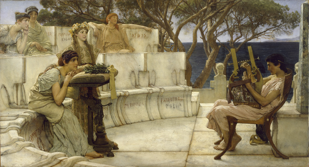 A painting showing an ancient stone theater. On the benches on the left sit a group of young women wearing long dresses. They are watching a male performer who sits on the right of the painting. he is sitting on a wooden chair and playing an instrument like a lyre.