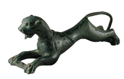 A dark-colored metal model of a leaping leopard. Its front and back legs are stretched out and it has small round spots on its surface.
