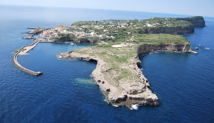 An aerial photo of a small island surrounded by sea.