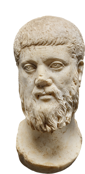 A marble bust of a man with a beard. He is looking thoughtfully into the distance.