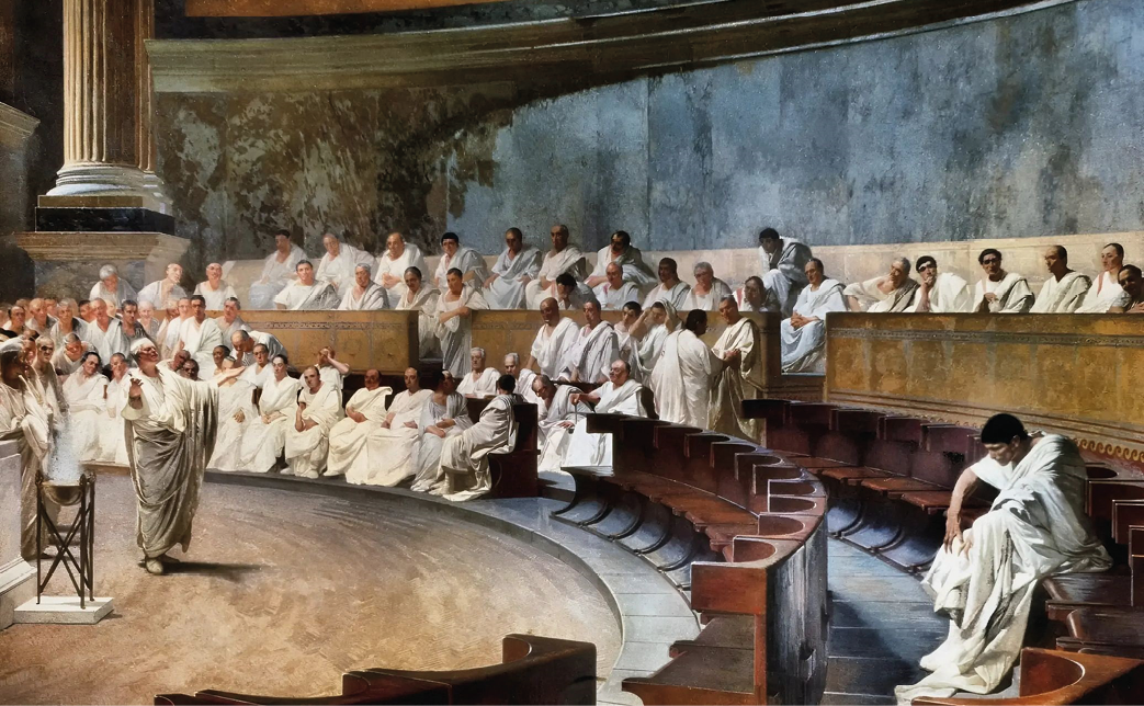 A painting showing a curved room with benches. Men in togas are sitting on the benches and listening to a man who stands on the right and is gesticulating with his hands. On the left of the painting is a man sitting alone looking down.