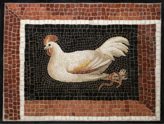 A mosaic with a black background and red and white frame. In the center is a white rooster with its legs bound.