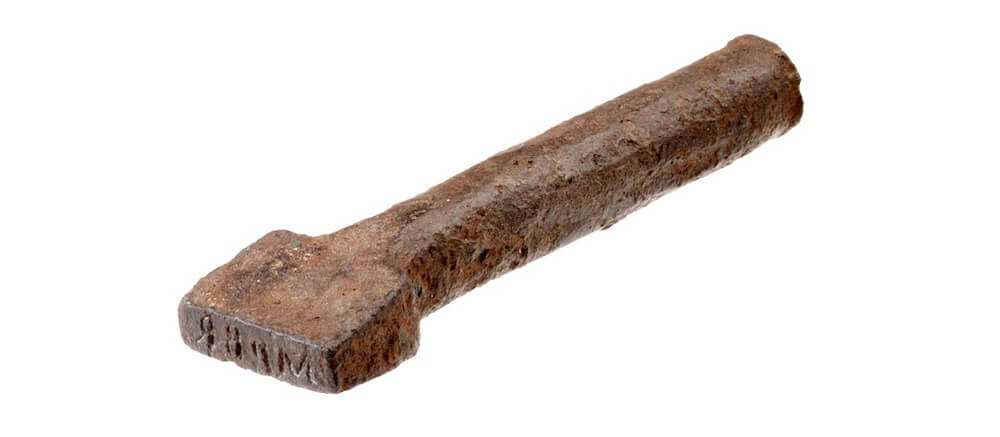 Iron stamp with the Latin characters MPBR set into it.